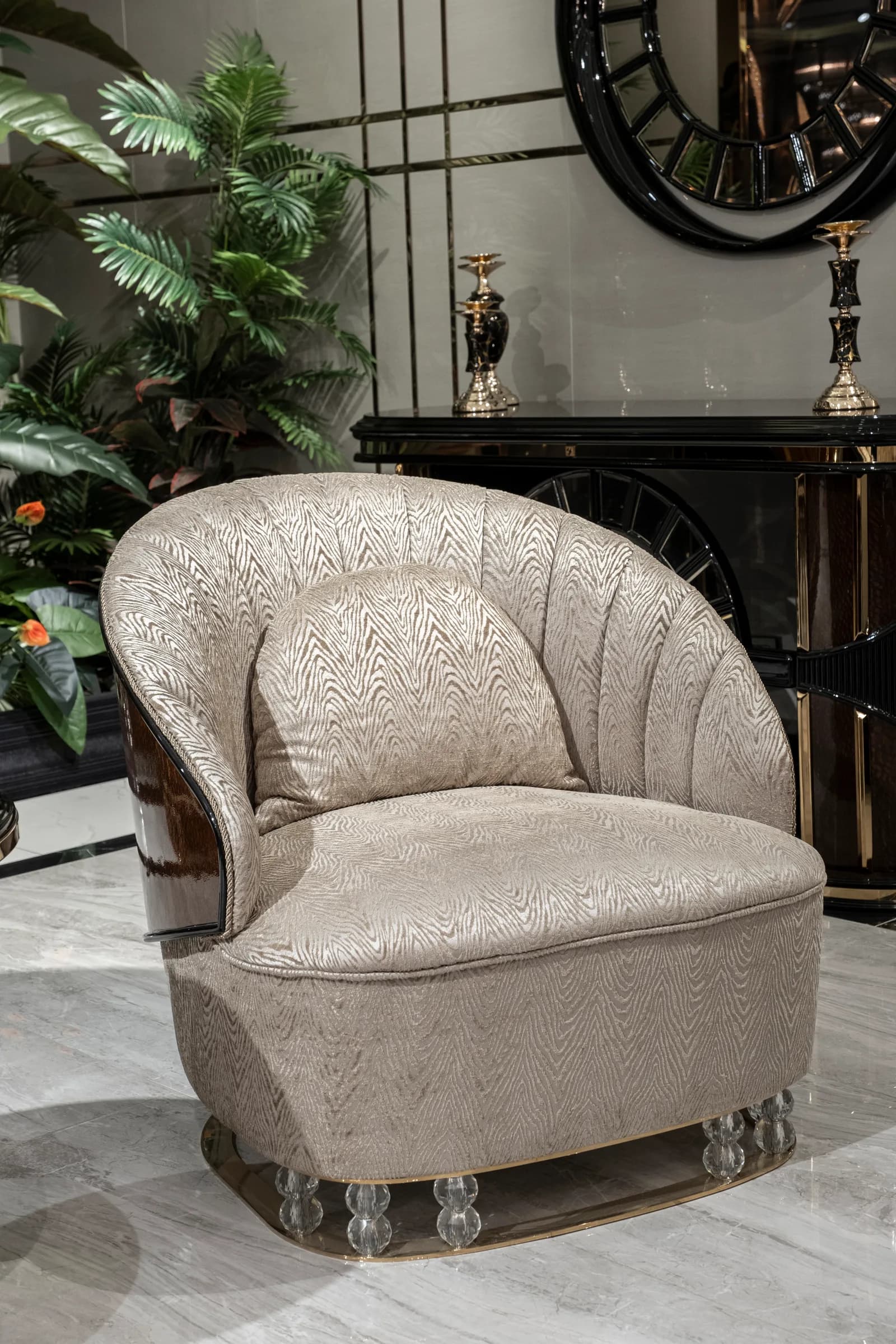 Scalloped armchair and console in the Arche UAE showroom, Sharjah